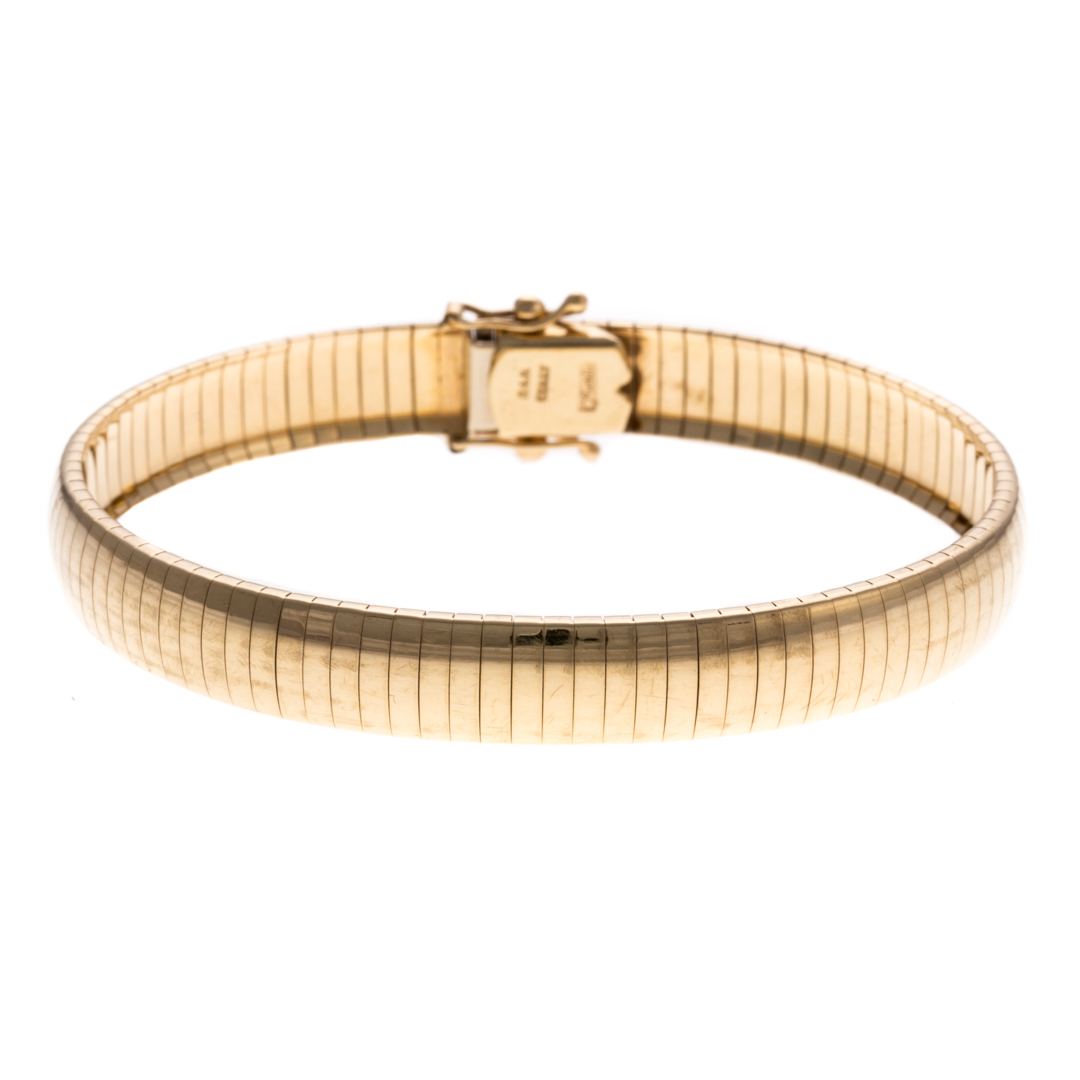 Appraisal: A Lady's K Gold Flexible Bangle Bracelet K yellow gold