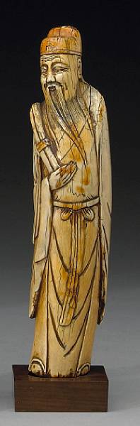 Appraisal: A pieced ivory immortal th th Century Shown holding what