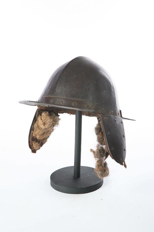 Appraisal: HELMET European steel Early helmet with movable ear guards Retains