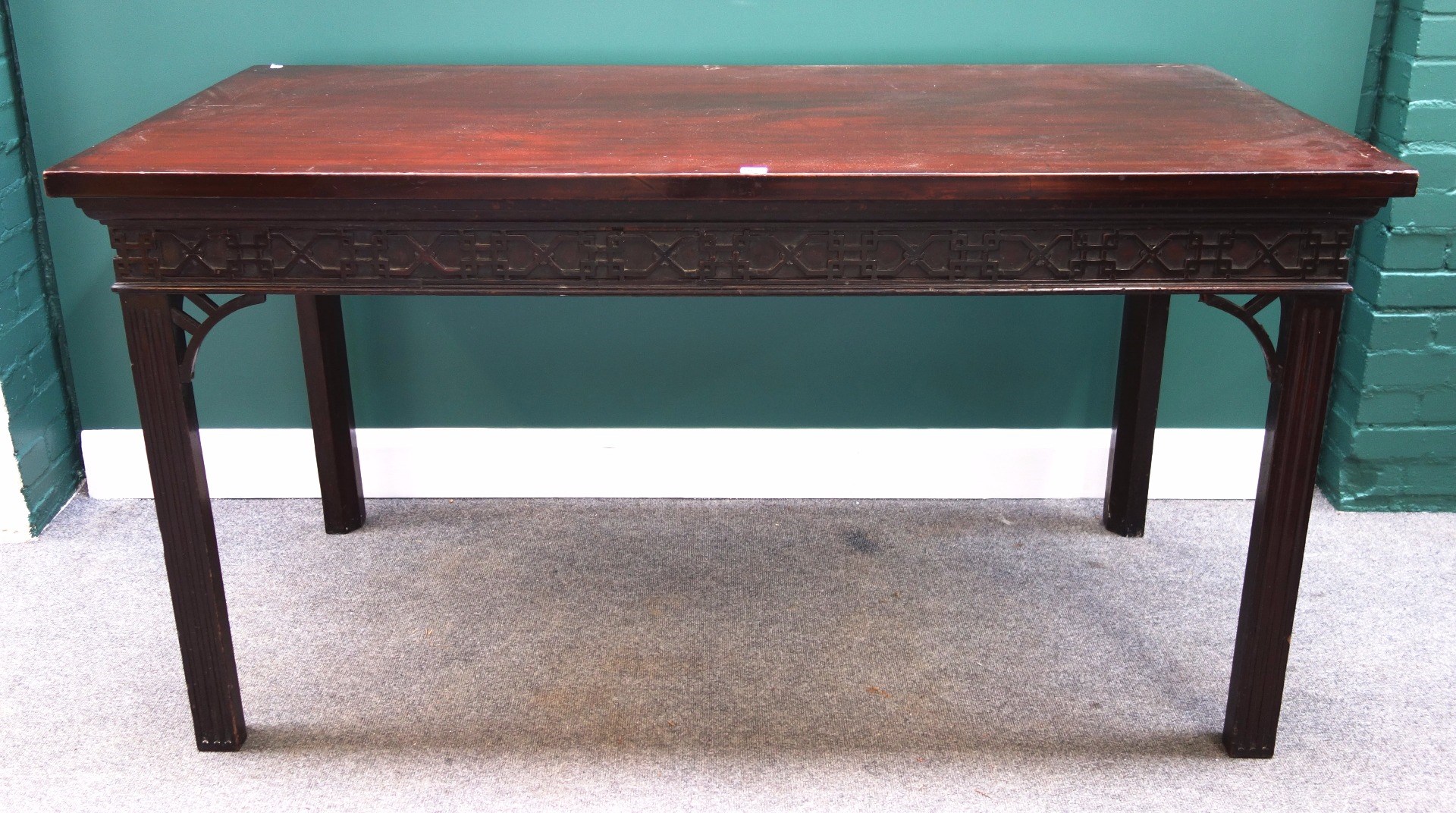 Appraisal: An th century style rectangular mahogany serving table with blind