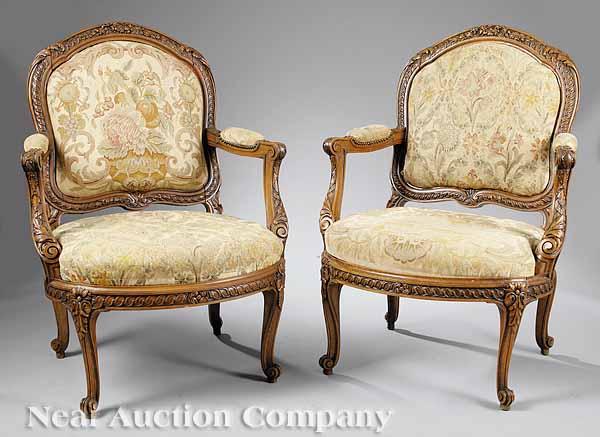 Appraisal: A Pair of Antique Louis XV-Style Carved Walnut Fauteuils of