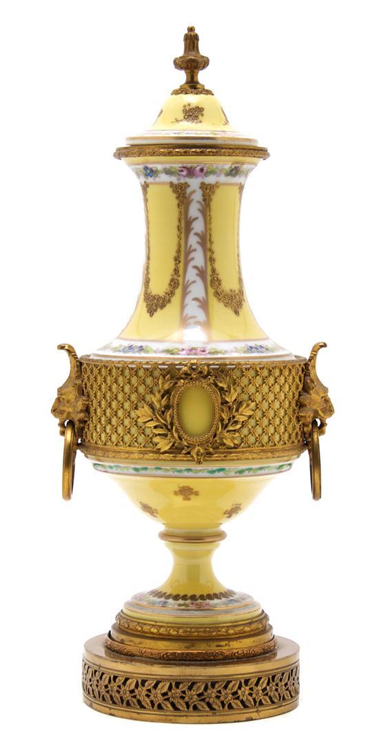 Appraisal: Sevres Style Gilt Metal Mounted Urn of baluster form with