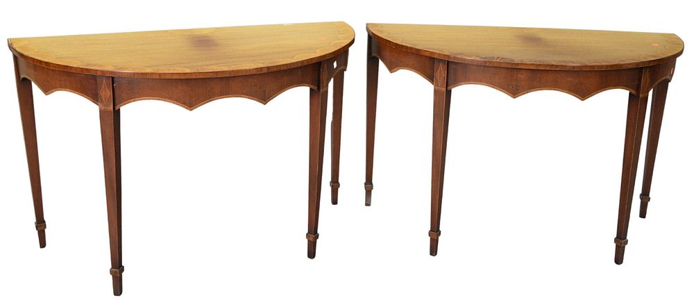 Appraisal: Pair Mahogany Demilune with carved skirts height inches width inches