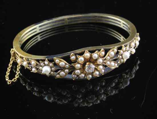 Appraisal: An Edwardian gold diamond and split pearl bracelet of floral