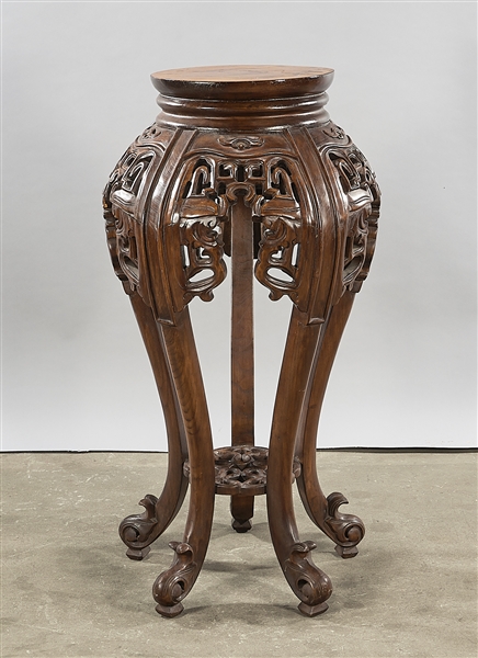 Appraisal: Chinese carved wood stand with curved legs and openwork design