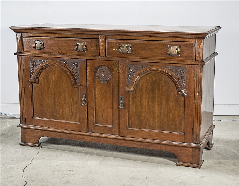 Appraisal: th c two-piece cabinet above is a double column flanked