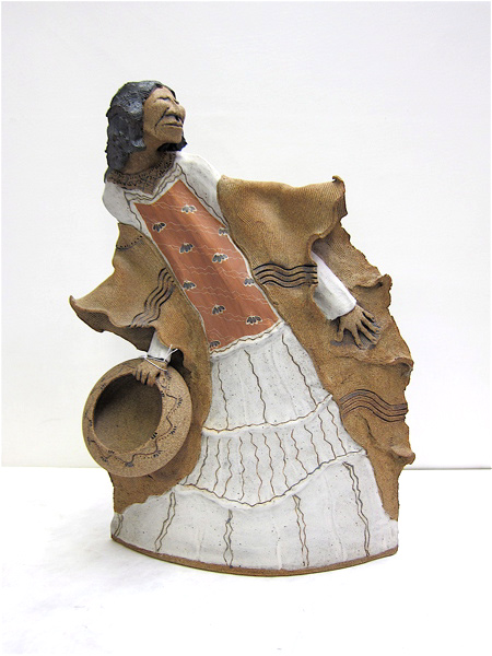 Appraisal: CERAMIC SCULPTURE Native American woman holding a basket signed Douglas