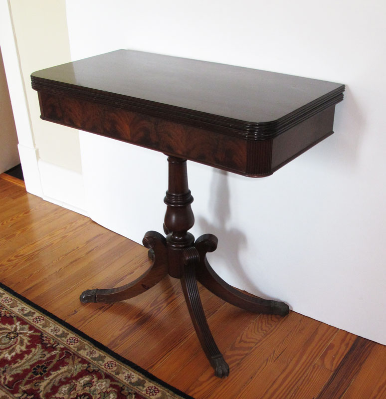 Appraisal: MAHOGANY GAME TABLE Flip top table doubles in size central