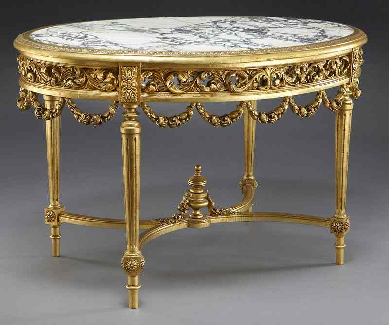 Appraisal: Louis XVI style gilt marble top center table the oval