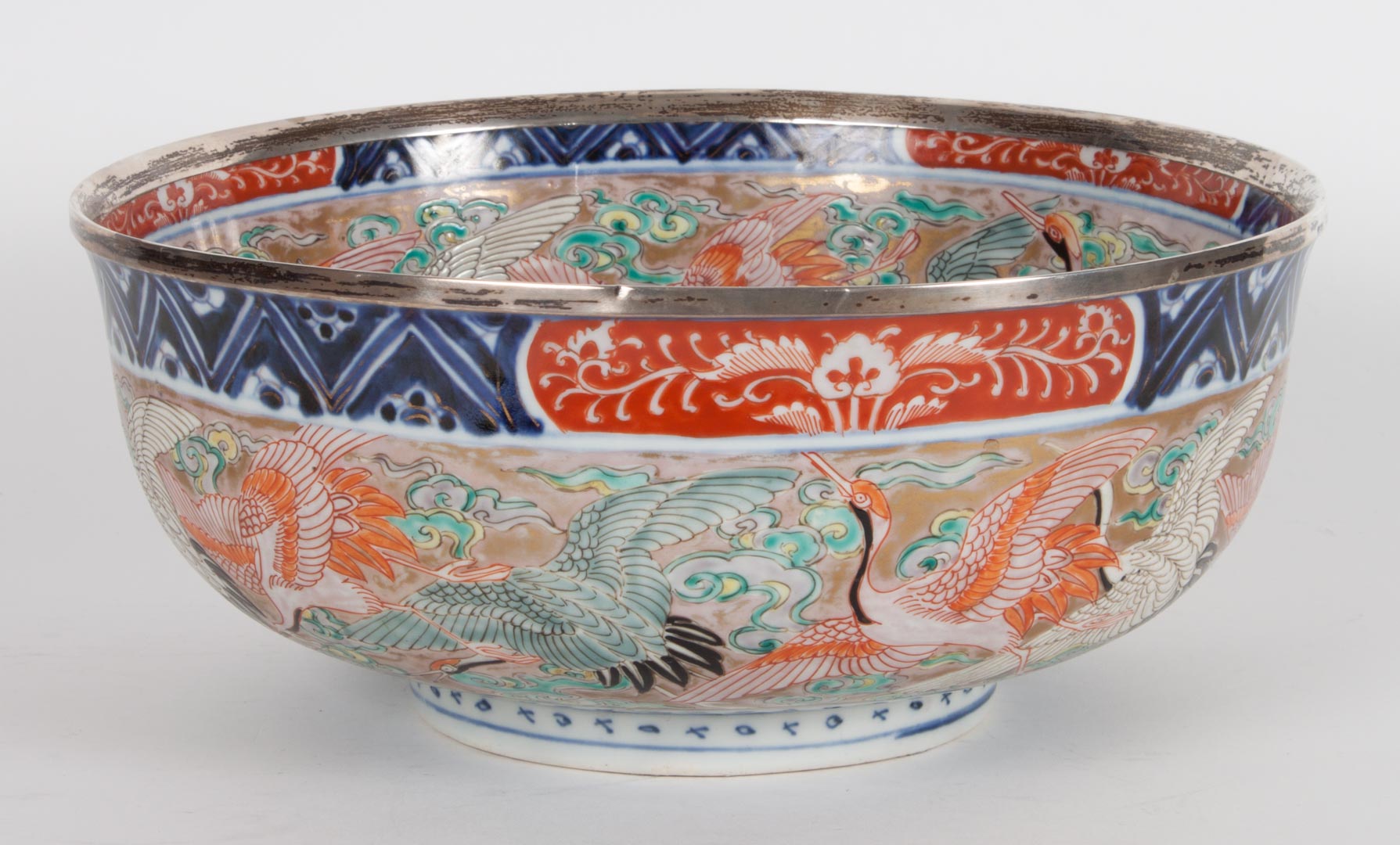 Appraisal: Japanese Imari porcelain bowl with silver rim second half- th