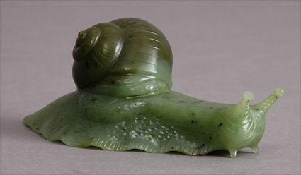 Appraisal: CARVED NEPHRITE FIGURE OF A SNAIL Monogrammed L W and