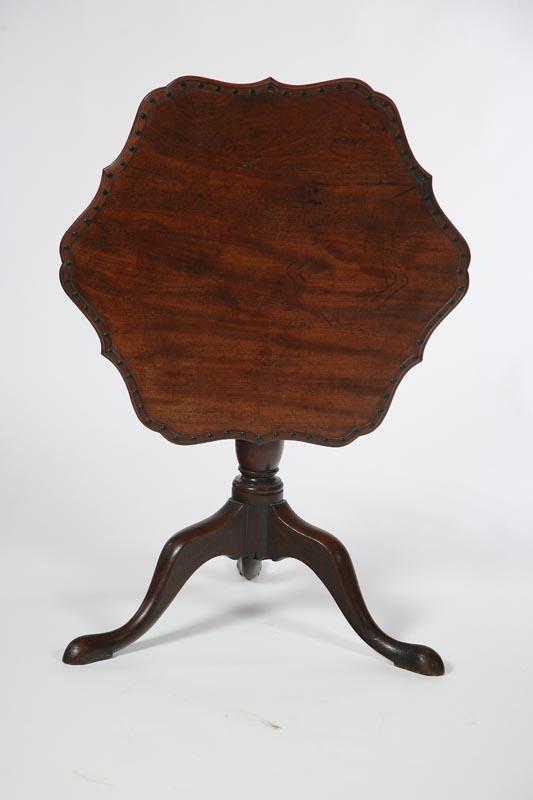 Appraisal: GEORGIAN TILT-TOP TEA TABLE English th century mahogany Shaped top