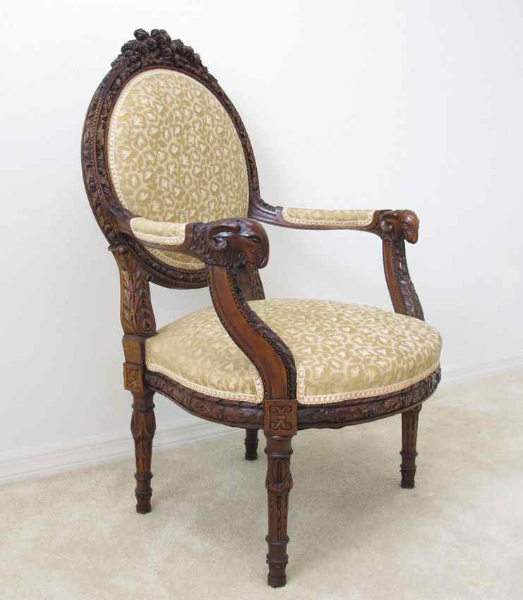 Appraisal: LOUIS XVI CARVED RAMS HEAD CHAIR Heavily carved with crossed