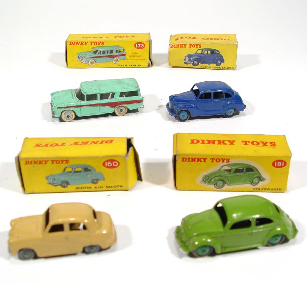 Appraisal: Four boxed Dinky Toys cars - Volkswagen Austin A Saloon