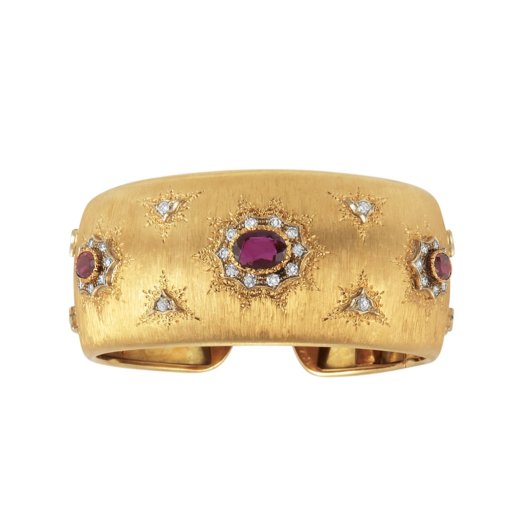 Appraisal: Gold Garnet and Diamond Cuff Bangle Bracelet kt diamonds approximately