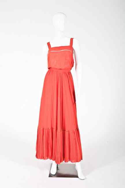 Appraisal: SALMON SILK ORGANZA GOWN s- s With pleated hem