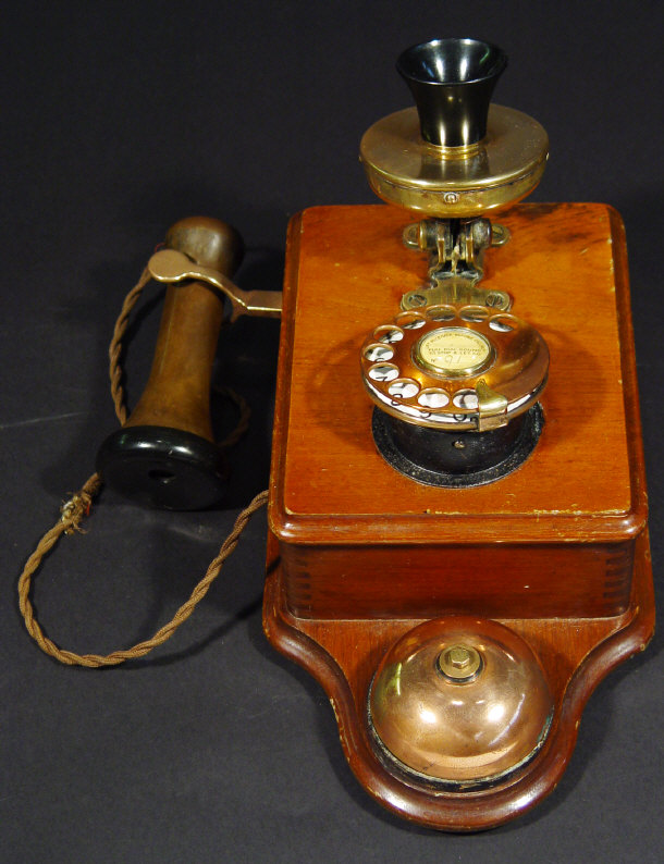 Appraisal: Edwardian mahogany wall telephone with copper and brass fittings and