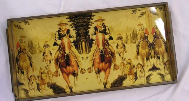 Appraisal: Reverse painted glass tray with cowboy scene with display stands