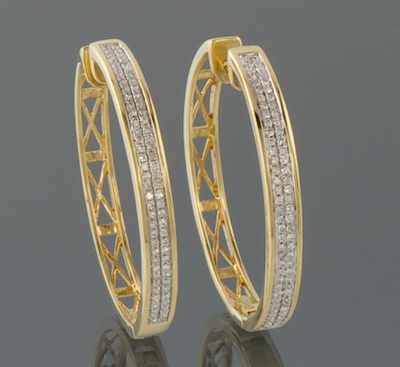 Appraisal: A Pair of Diamond Hoop Earrings Yellow gold hoop earrings