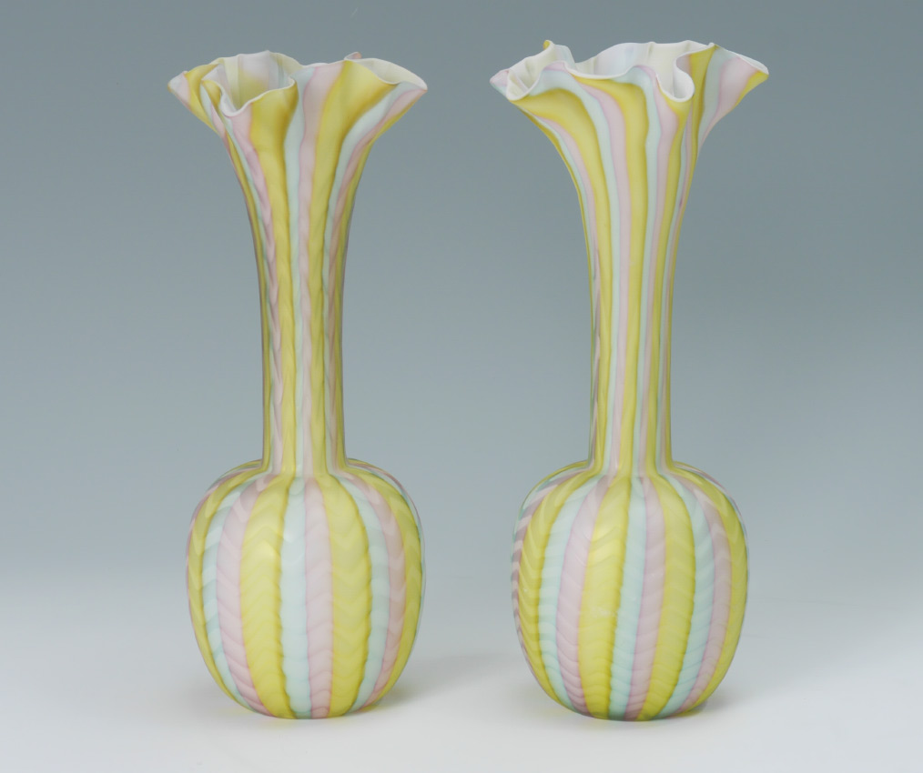 Appraisal: PAIR RAINBOW HERRINGBONE SATIN GLASS VASES Long neck with ruffle