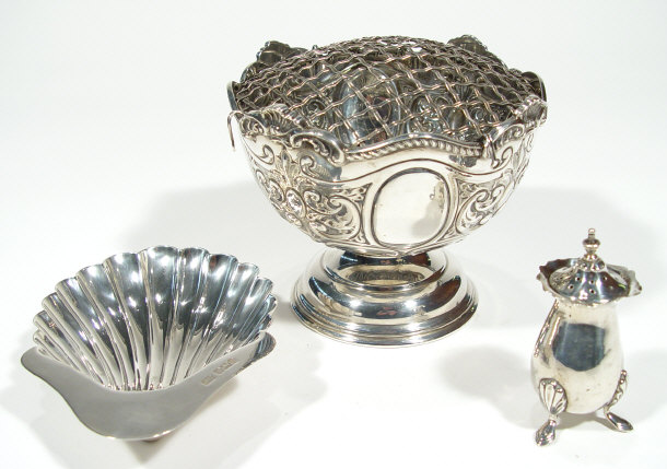 Appraisal: Silver pedestal rose bowl with embossed decoration a shell shaped