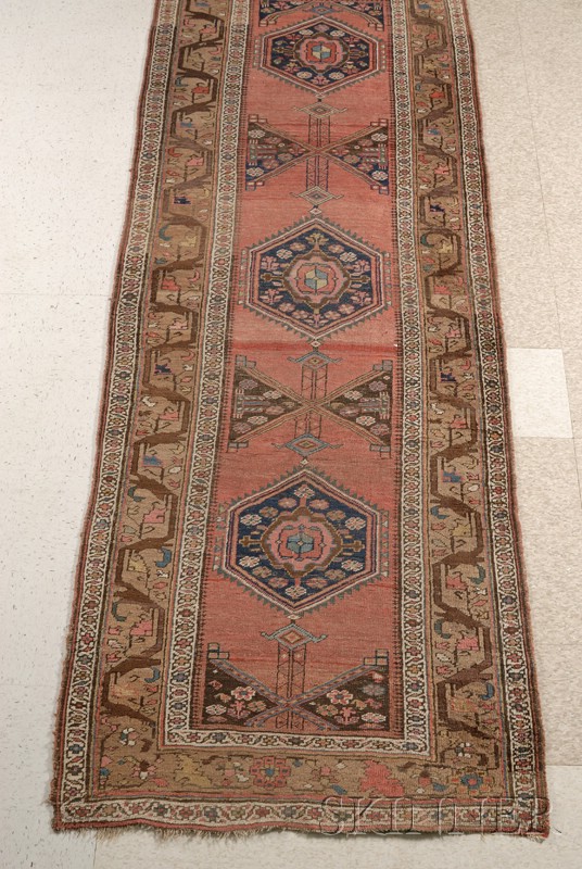 Appraisal: Northwest Persian Corridor Carpet with three midnight blue medallions brick