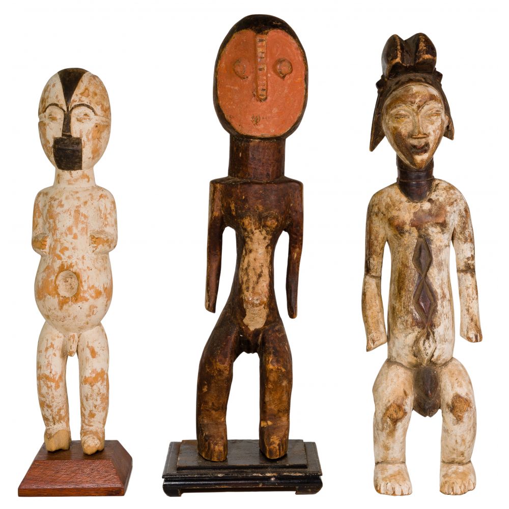 Appraisal: ETHNOGRAPHIC CARVED WOOD FIGURE ASSORTMENT items including having white-wash finish