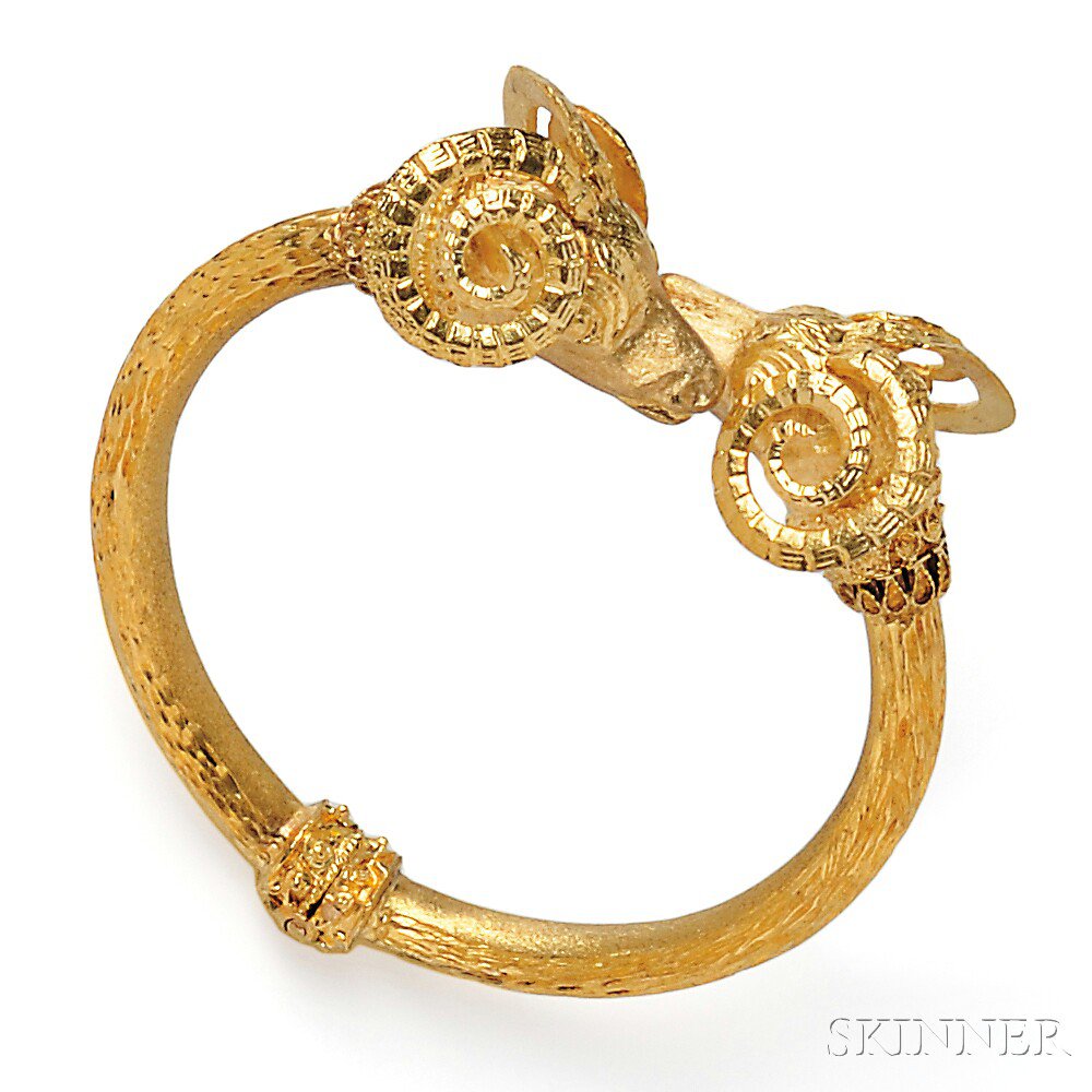 Appraisal: kt Gold Bypass Bracelet the hinged bangle with ram's head