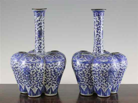 Appraisal: A pair of Chinese blue and white multiple tulip vases