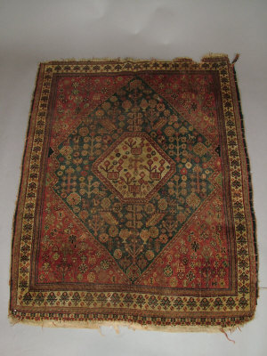 Appraisal: A Ghashgai rug with ivory medallion in a blue field