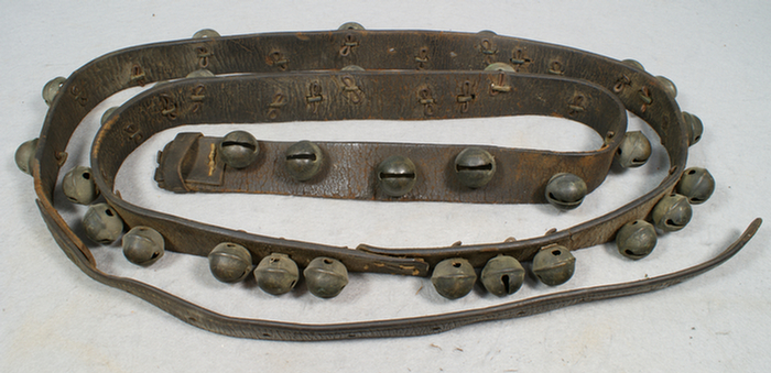 Appraisal: brass sleigh bells leather strap Estimate -