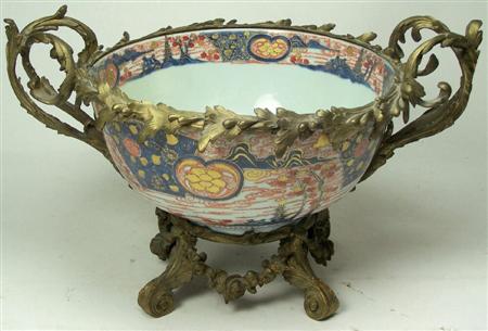 Appraisal: A th century Imari porcelain bowl with ornate gilt bronze