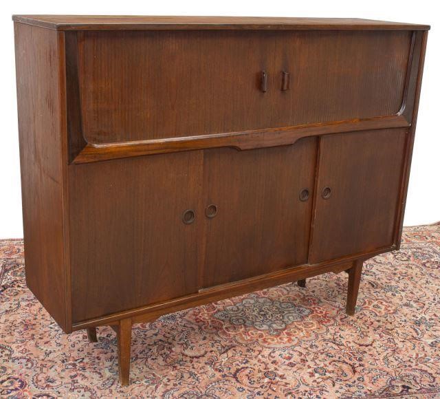 Appraisal: Danish mid-century modern sideboard c s upper tambour doors open