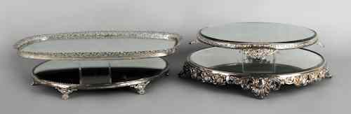 Appraisal: Four silver plated mirrored plateaus