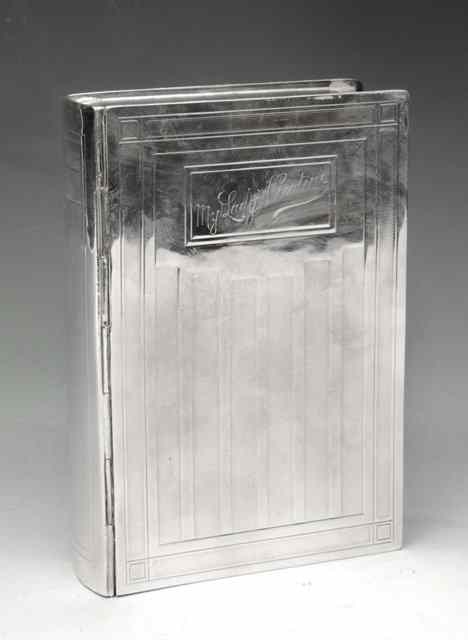 Appraisal: A SILVER MOUNTED CIGARETTE BOX in the form of a