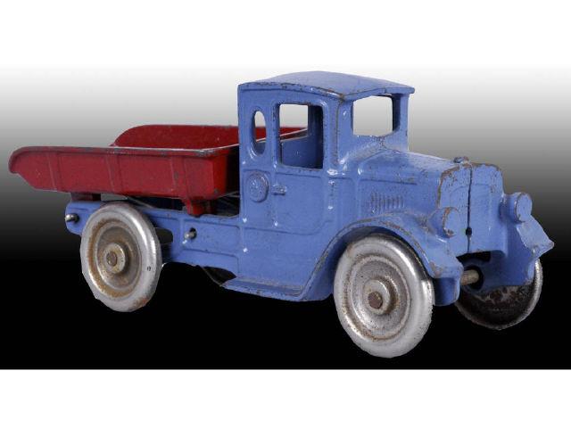 Appraisal: Cast Iron Kilgore Dump Truck Toy Description Blue chassis with