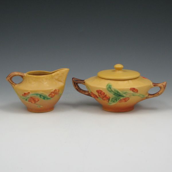 Appraisal: Roseville Bittersweet creamer and sugar in yellow Both marked Roseville