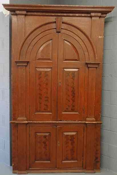 Appraisal: Pennsylvania pine architectural corner cabinet th c in two parts