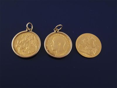 Appraisal: A sovereign and two sovereigns and in gold pendant mounts