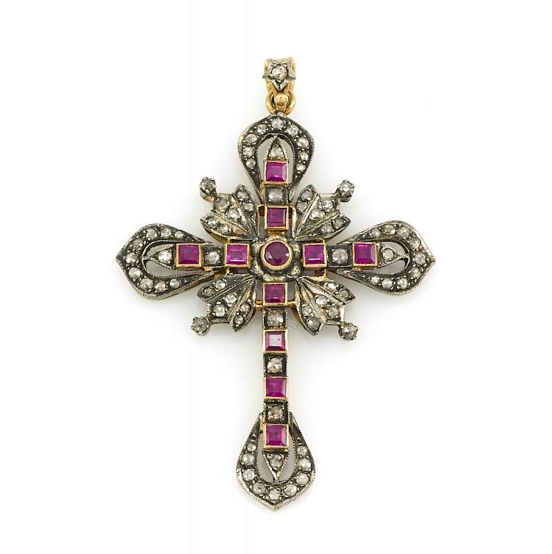 Appraisal: k and silver ruby and diamond cross k and silver