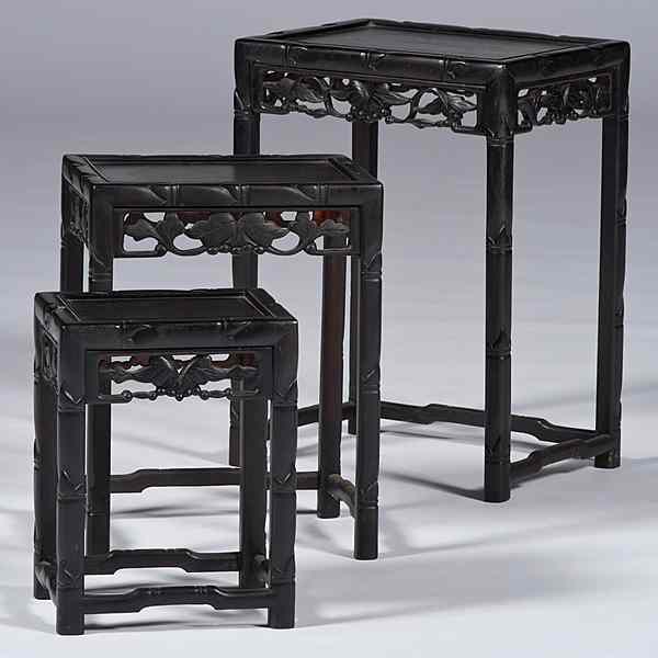 Appraisal: Chinese Nesting Tables Chinese A set of three carved Chinese