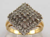 Appraisal: An carat gold baguette and round brilliant cut diamond ring