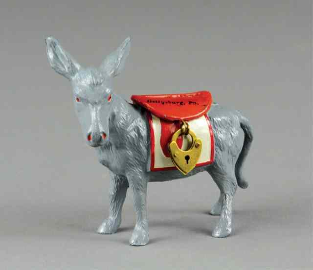 Appraisal: LEAD DONKEY SOUVENIR STILL BANK Germany hand painted with key