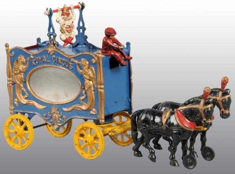 Appraisal: Cast Iron -Horse RoyalCircus Clown Trapeze Wagon Description CORRECION -