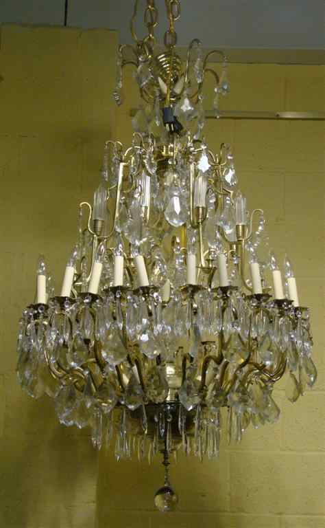 Appraisal: LARGE LOUIS XV STYLE BRASS AND GLASS CAGE-FORM CHANDELIER Mounted