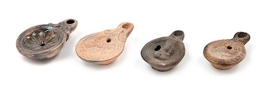 Appraisal: Three Roman Terra Cotta Oil Lamps Width of largest inches