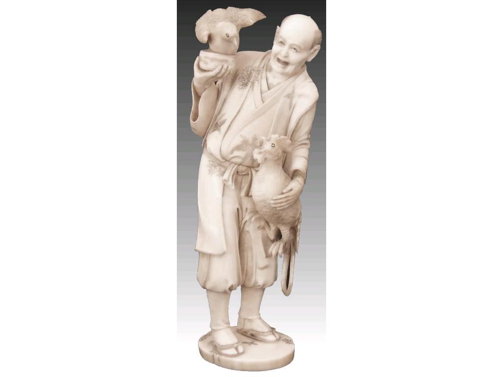 Appraisal: Japanese ivory okimono of an elderly man holding a cockerel