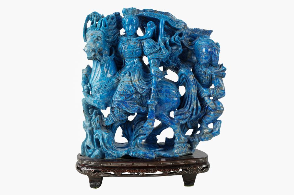 Appraisal: CHINESE CARVED LAPIS GROUPaffixed to wood stand with putty the