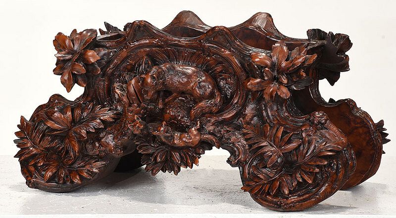 Appraisal: Black Forest Style Carved Wood Planter Continental rectangular form with