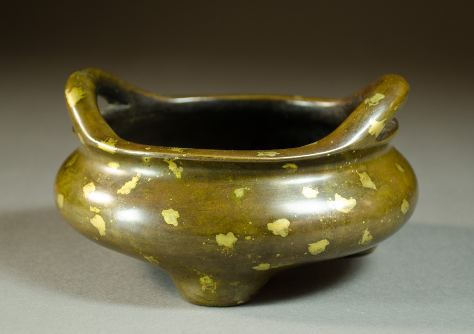 Appraisal: CHINESE GOLD-SPLASHED BRONZE CENSER the circular bowl with cast bronze